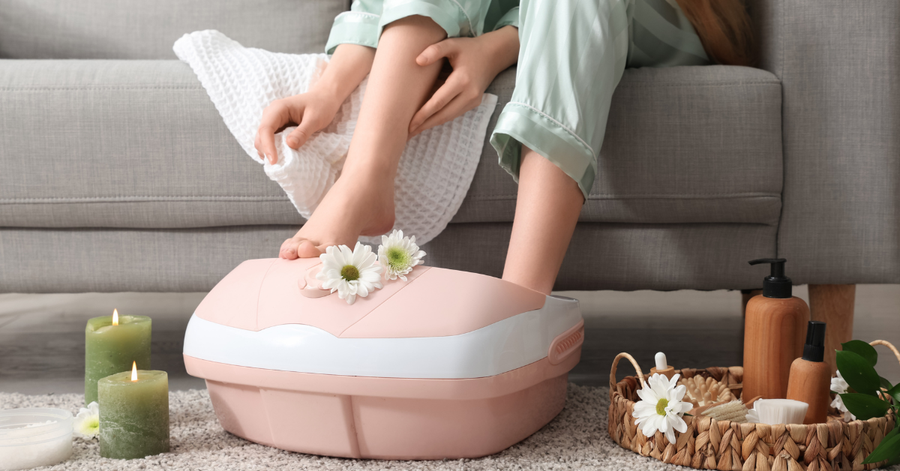 A relaxing foot bath with crystals and self-care products