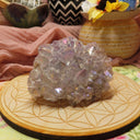 Aura-coated amethyst crystal cluster